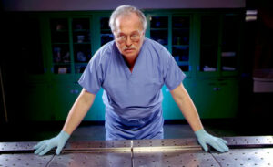 Dr. Michael Baden at work